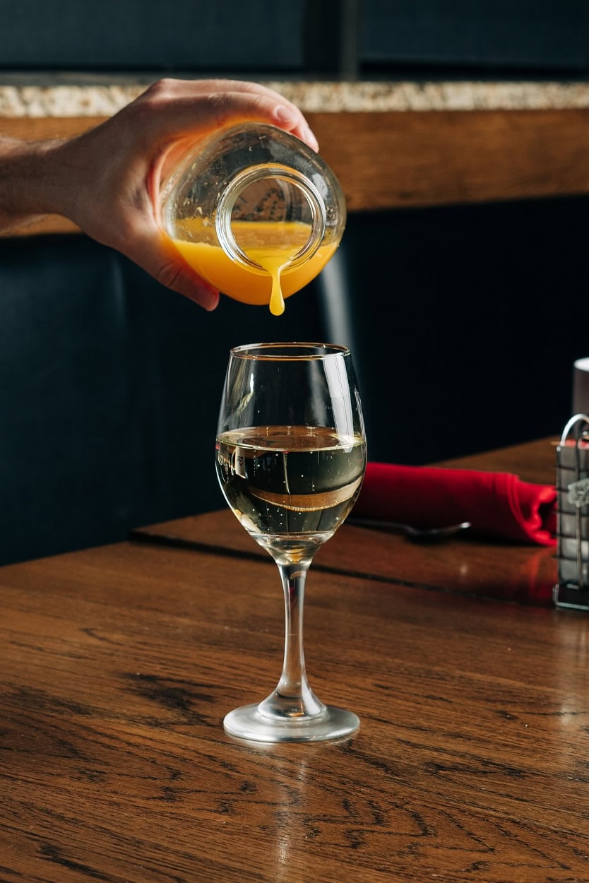 Hand Pouring Mimosa 1